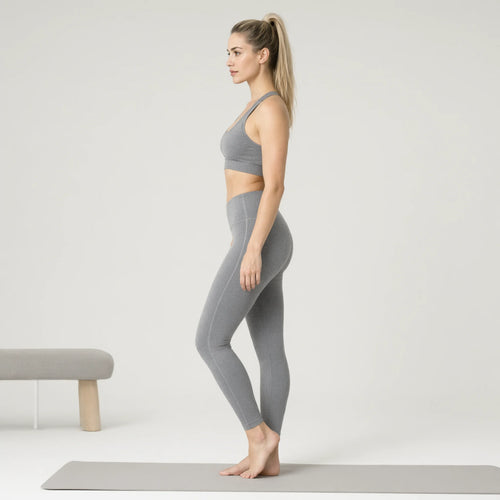 Grey | 2-Piece Seamless Sports-Back Yoga Set for Women｜DUVETMOON – side view (ankles gently crossed)