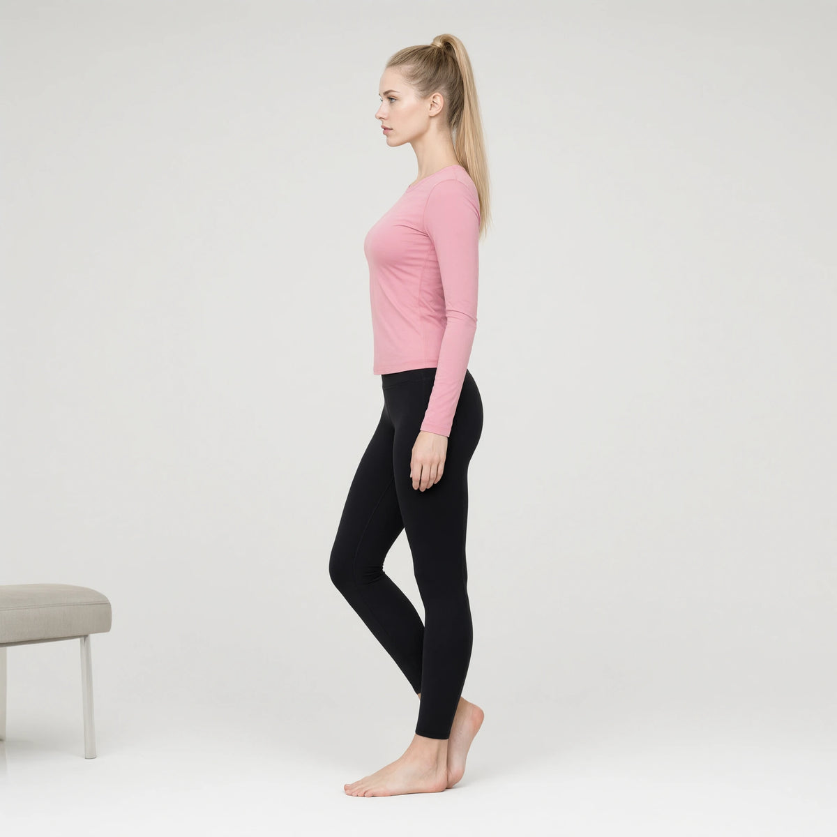 Pink | Running Long Sleeve Slim T-shirt Yoga Top｜DUVETMOON – side view (ankles gently crossed)