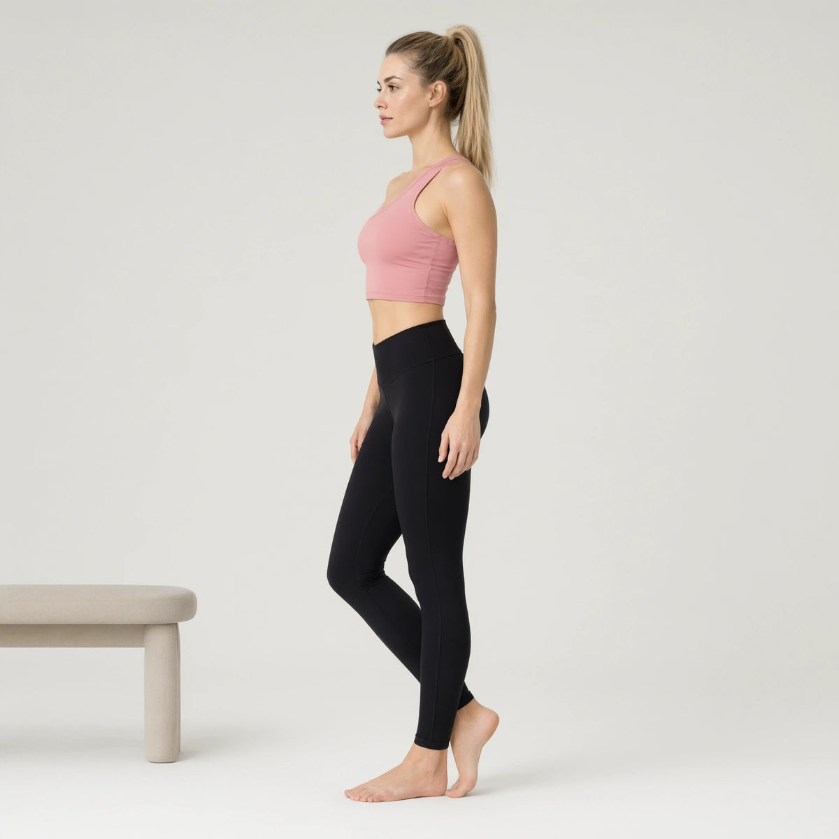 Pink | Backless Yoga Tank Top Shirts Sleeveless Off Shoulder｜DUVETMOON – side view (ankles gently crossed)