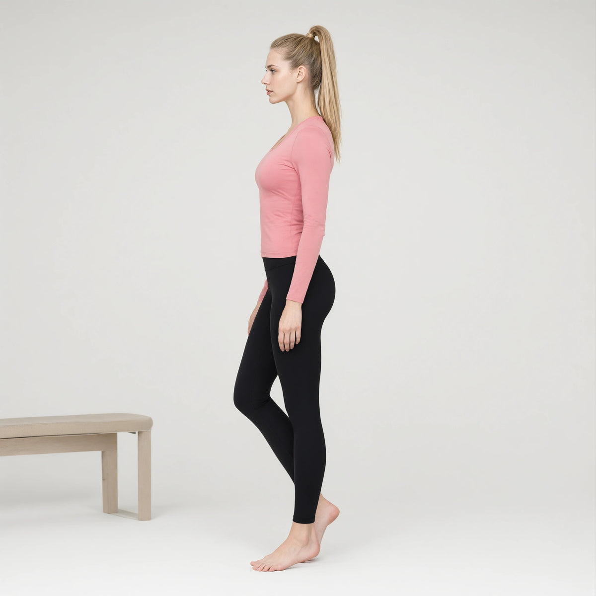 Pink | Rib Long Sleeve Running Dress Skinny Sports Top｜DUVETMOON – side view (ankles gently crossed)