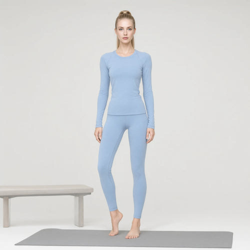 Light Blue | 2-Piece Long-Sleeve Brushed Yoga Set for Women｜DUVETMOON – front view (one foot stepped half a pace forward)