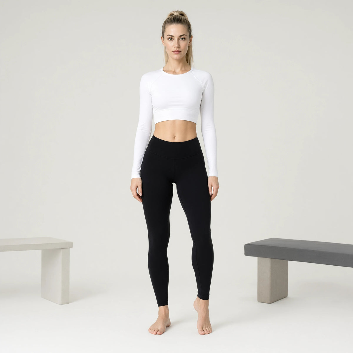 White | Fisoew Long Sleeve Crop Tops Loose Fit Crew｜DUVETMOON – front view (one foot stepped half a pace forward)