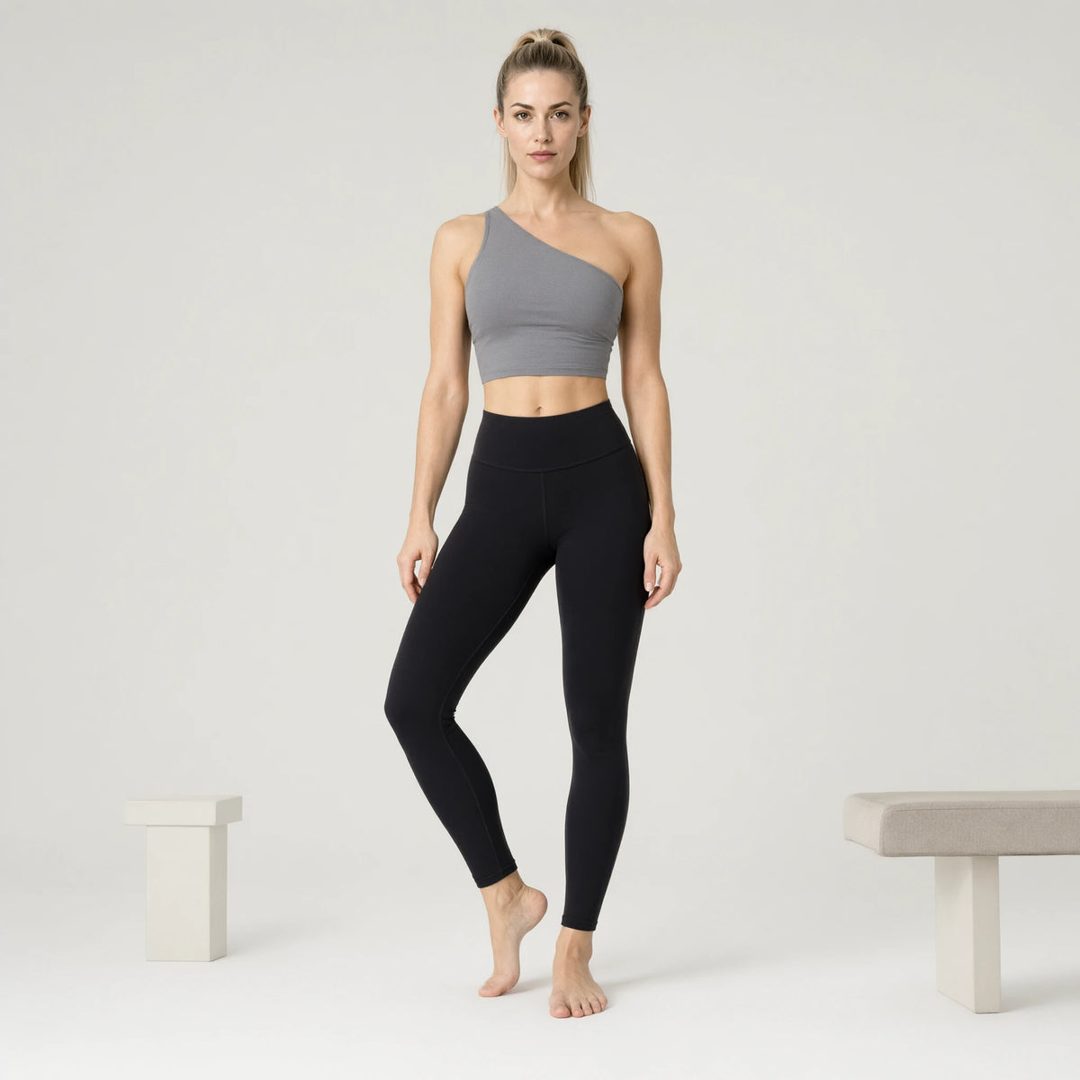 Gray | Backless Yoga Tank Top Shirts Sleeveless Off Shoulder｜DUVETMOON – front view (one foot stepped half a pace forward)