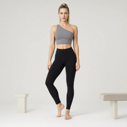 Gray | Backless Yoga Tank Top Shirts Sleeveless Off Shoulder｜DUVETMOON – front view (one foot stepped half a pace forward)