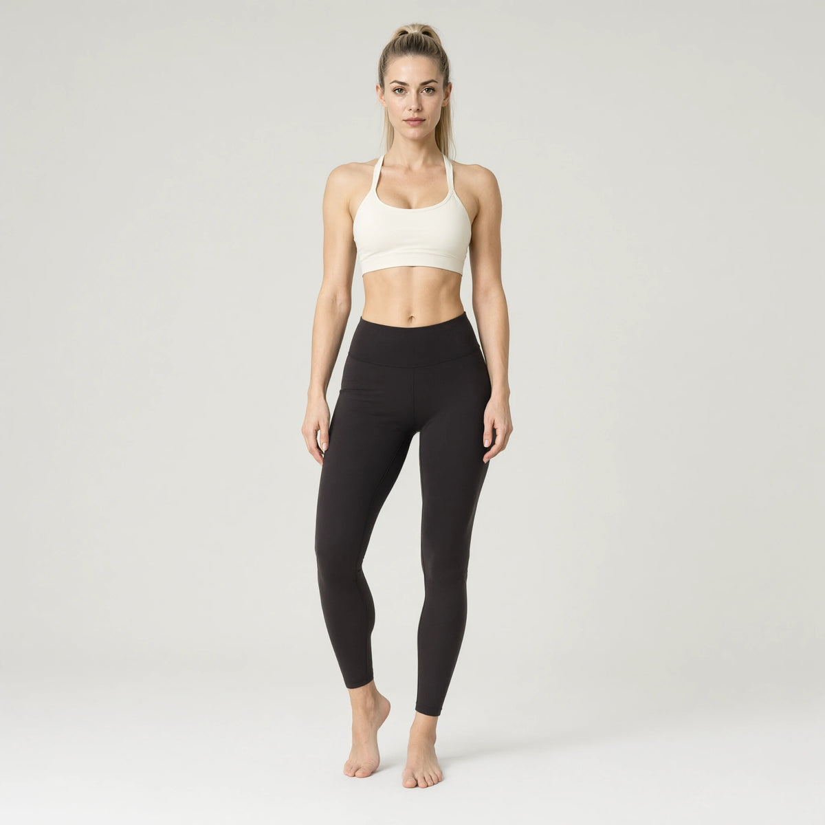 Ivory | 1pc Strap Sport Bras Padded Strappy Crop Square｜DUVETMOON – front view (one foot stepped half a pace forward)
