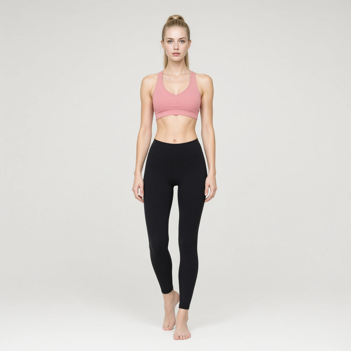 Pink | 1pc Deep V Neck Sports Bras U-shaped Back｜DUVETMOON – front view (one foot stepped half a pace forward)