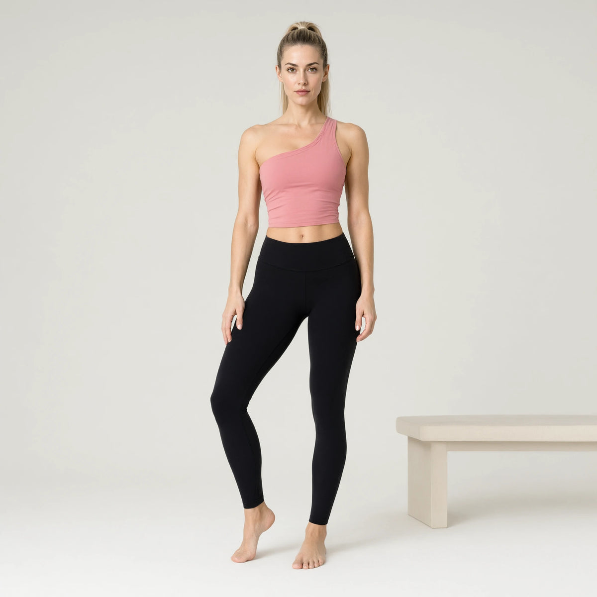 Pink | Backless Yoga Tank Top Shirts Sleeveless Off Shoulder｜DUVETMOON – front view (one foot stepped half a pace forward)