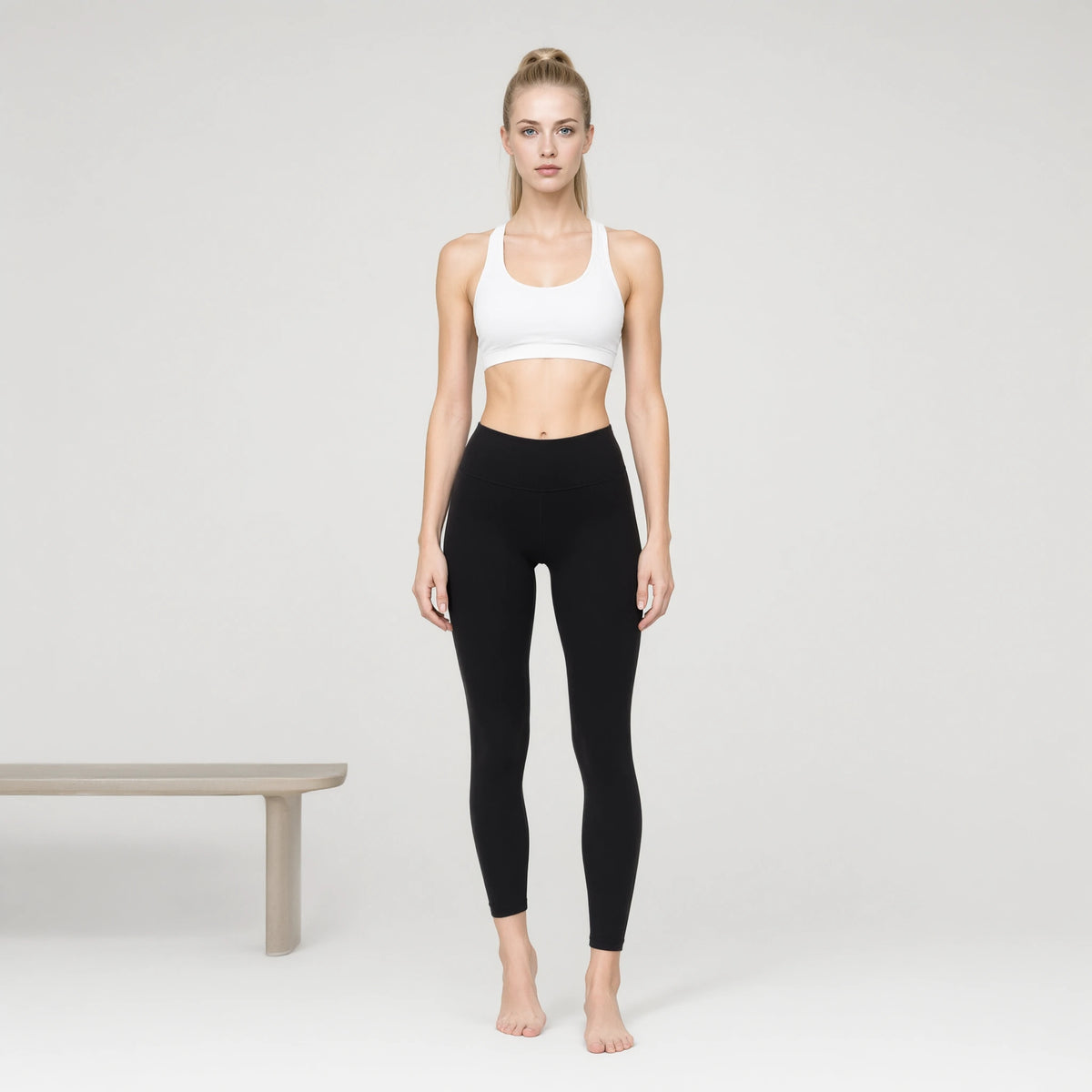 Padded White Bra | Personality Sports Seamless Bra｜DUVETMOON – front view (one foot stepped half a pace forward)