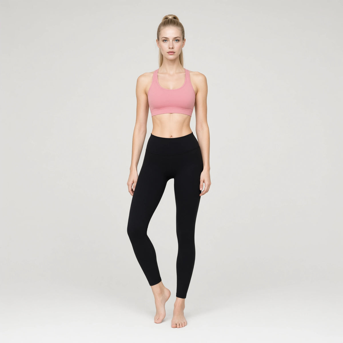 Pink | Professional Sports Seamless Bra｜DUVETMOON – front view (one foot stepped half a pace forward)
