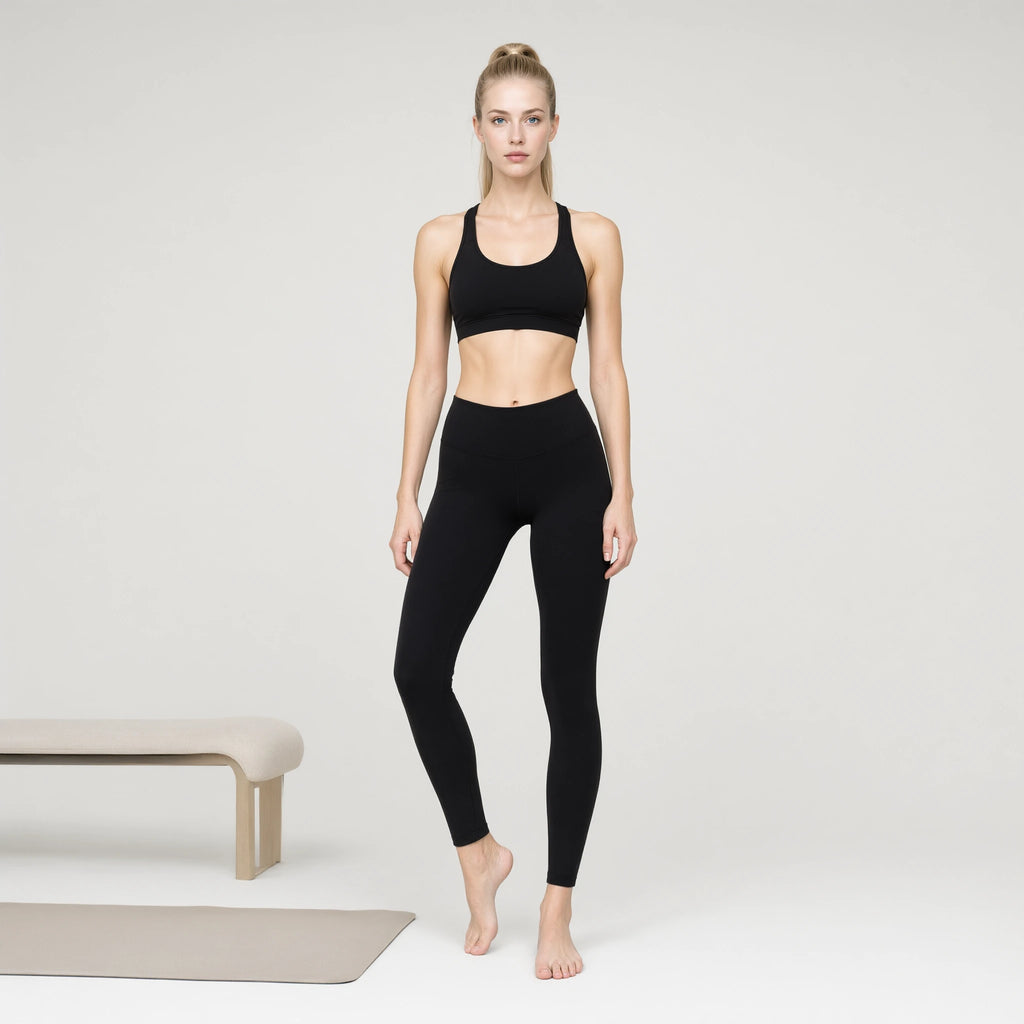 Padded Black Bra | Personality Sports Seamless Bra｜DUVETMOON – front view (one foot stepped half a pace forward)