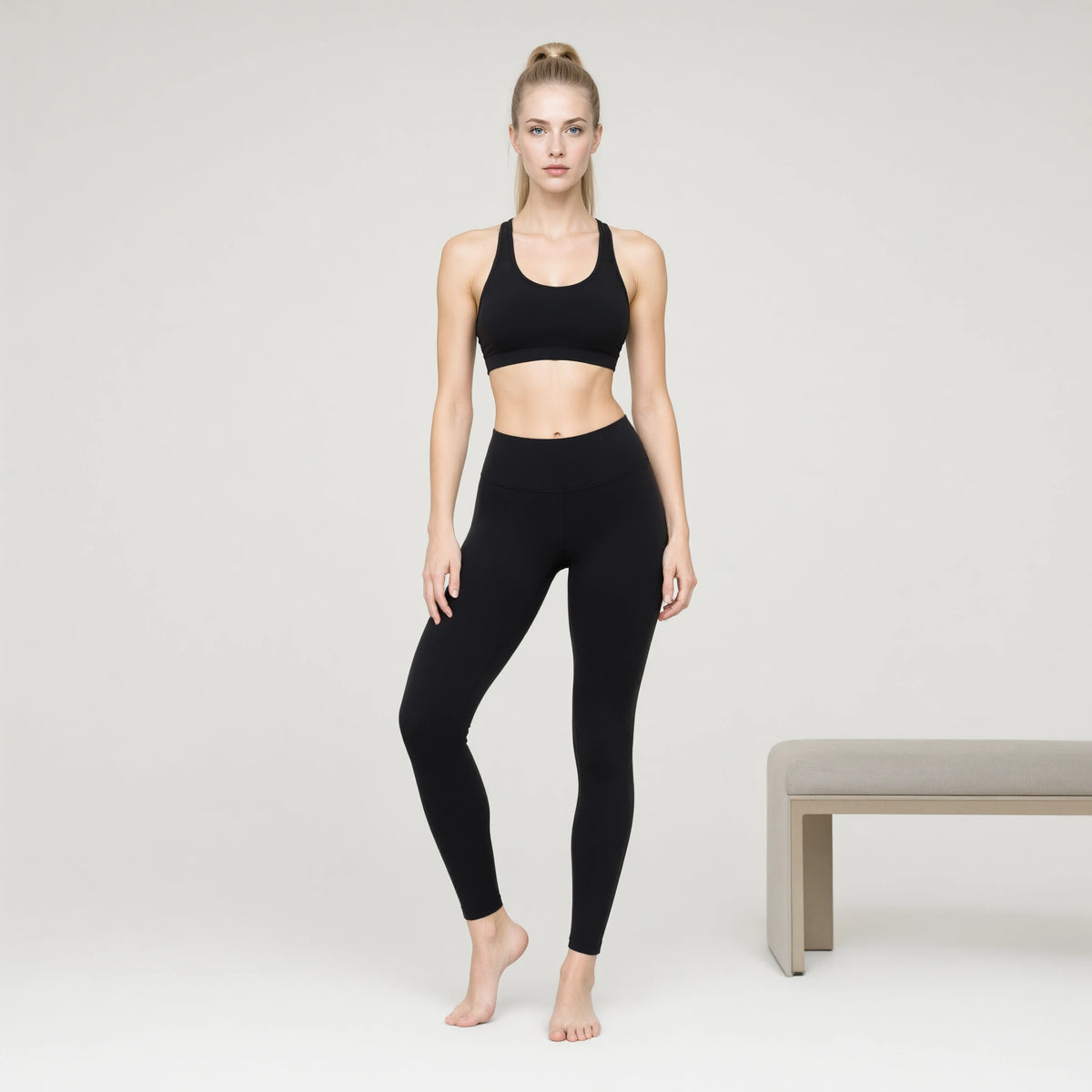 Black | Professional Sports Seamless Bra｜DUVETMOON – front view (one foot stepped half a pace forward)